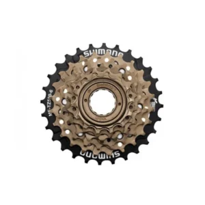 Тріскачка Shimano Tourney MF-TZ500 6 шв 14-28Т на білому тлі